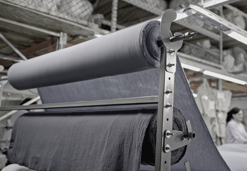 Large fabric rolls in a factory