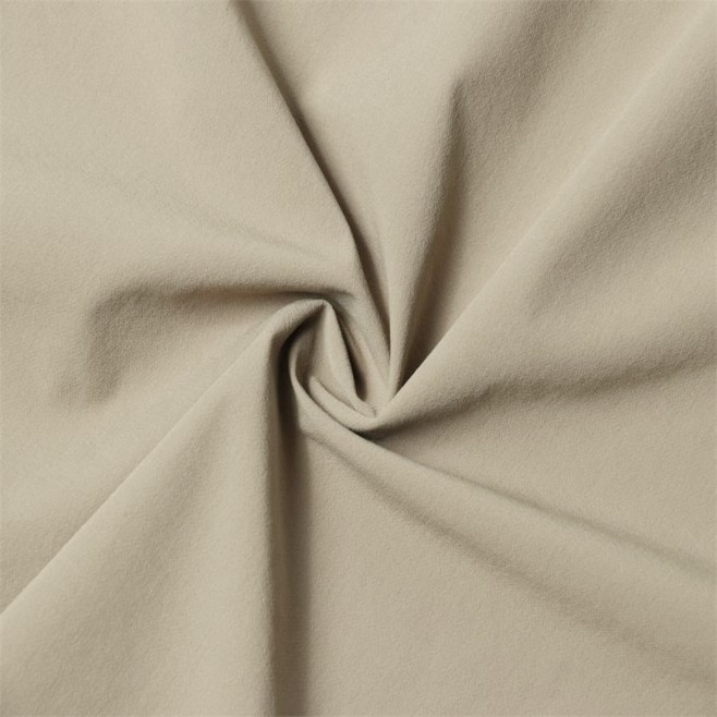 Smooth beige suede fabric for custom gloves.