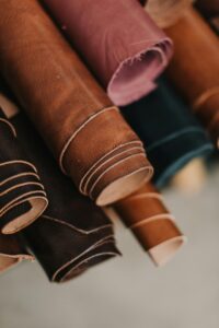 rolls-of-leather-in-different-colours Photo by Vlada Karpovich