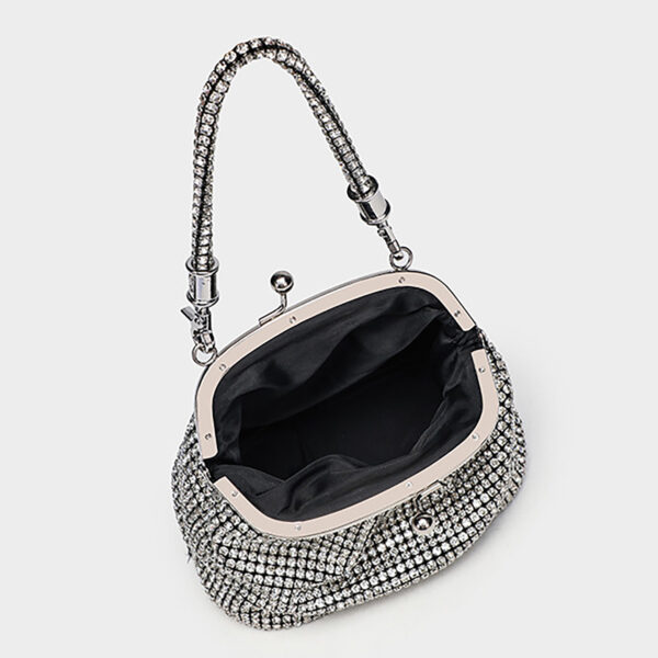 Inside view of evening bag showing polyester lining and ID pocket
