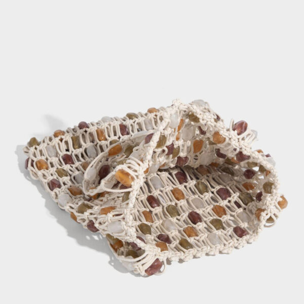 Open-top beaded net bag, interior view showing unlined construction