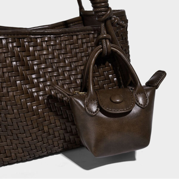 Detail of woven PU texture and matching mini pouch accent