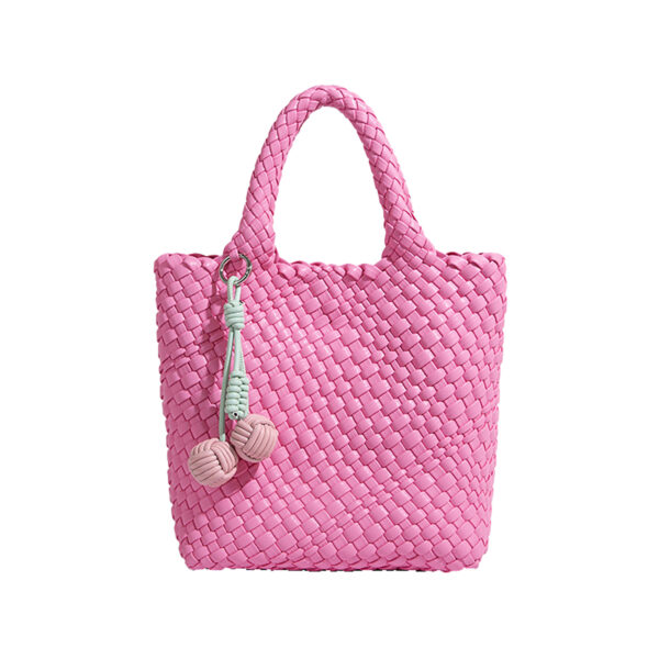 Pink small woven PU bucket tote with tassel charm, front view
