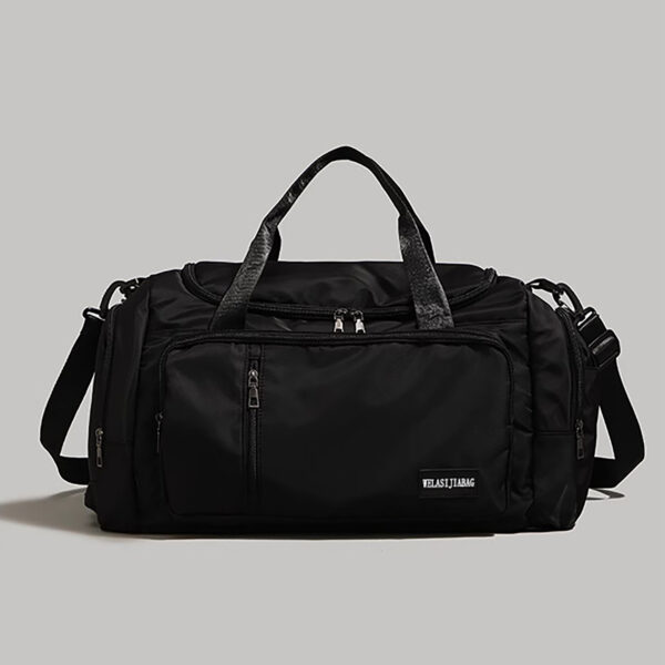Black gym duffle bag with top handles and shoulder strap