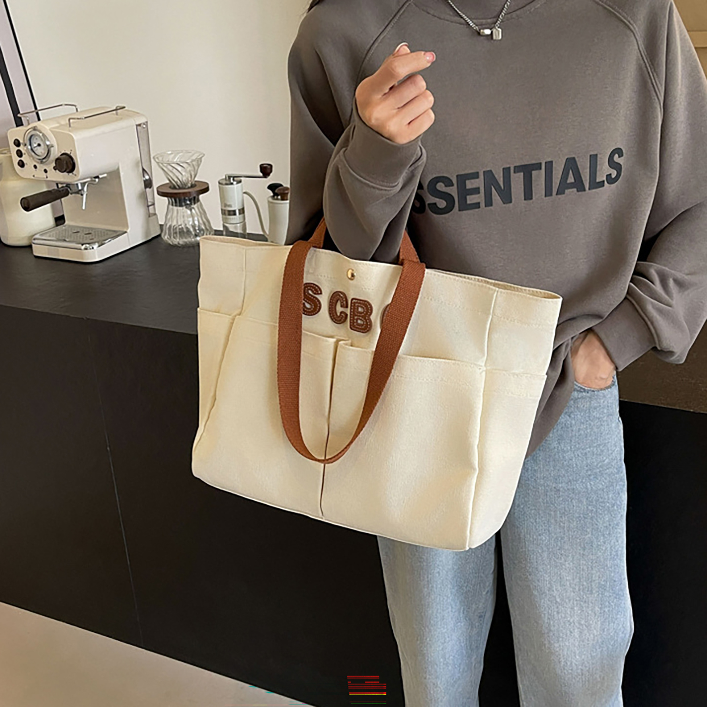 Off-white canvas tote handbag styled for casual office wear, custom logo capable.