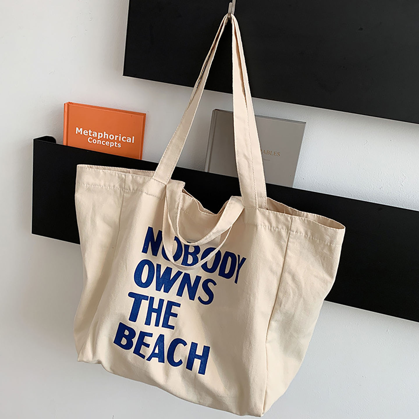 Large canvas tote bag with slogan, suitable for promotional printing and retail programs.