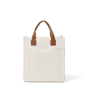 Vertical canvas tote bag, off-white, short webbing handles and front pocket for custom logo.