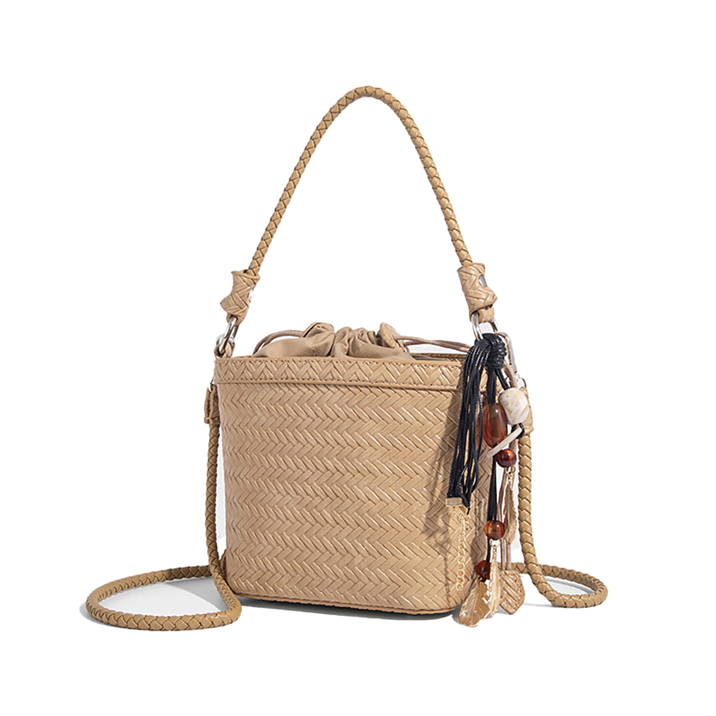 Khaki woven bucket bag with braided handle, crossbody strap, and drawstring pouch.