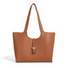 Brown premium PU leather bell tote bag for women with minimalist design and shoulder strap