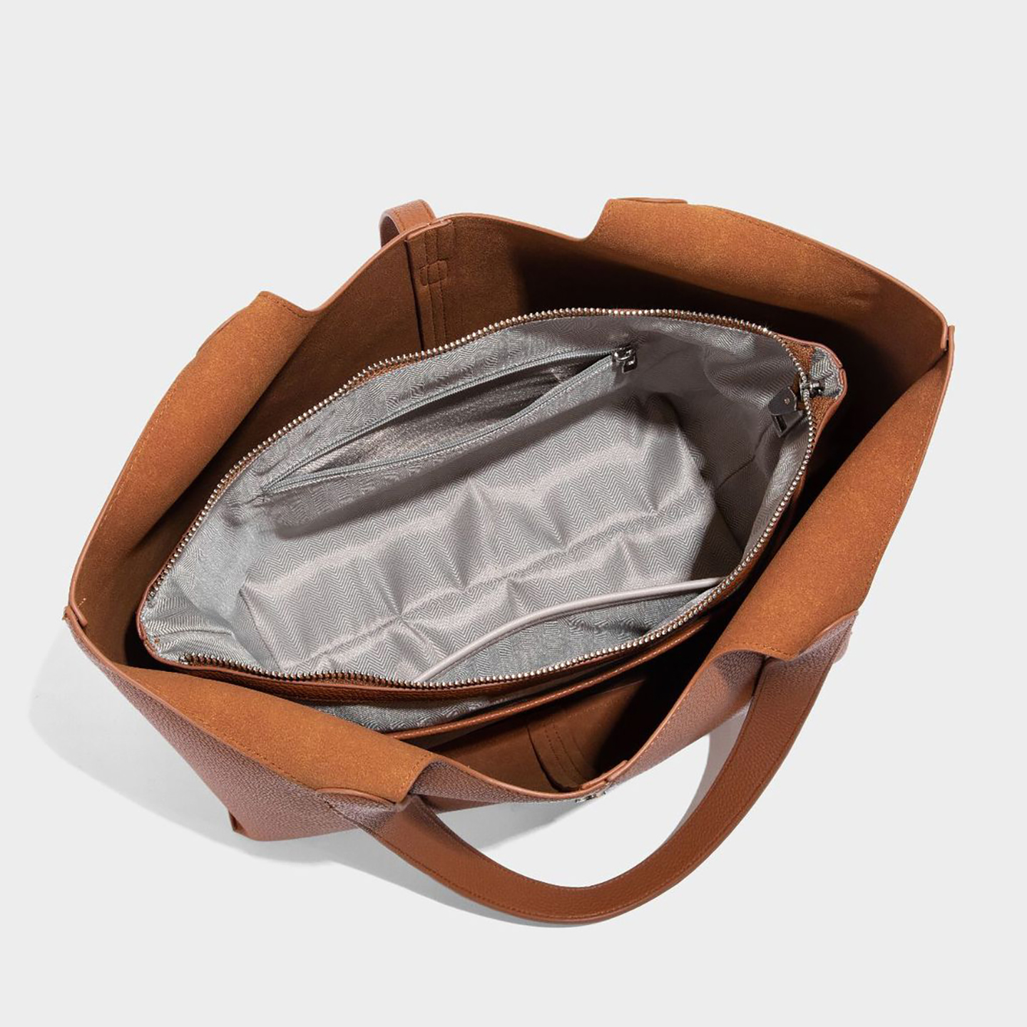 Interior view of premium PU leather bell tote bag showing inner zipper pocket