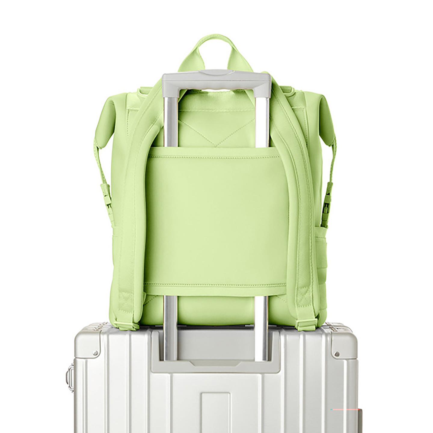 Green premium neoprene diaper bag backpack attached to luggage for travel