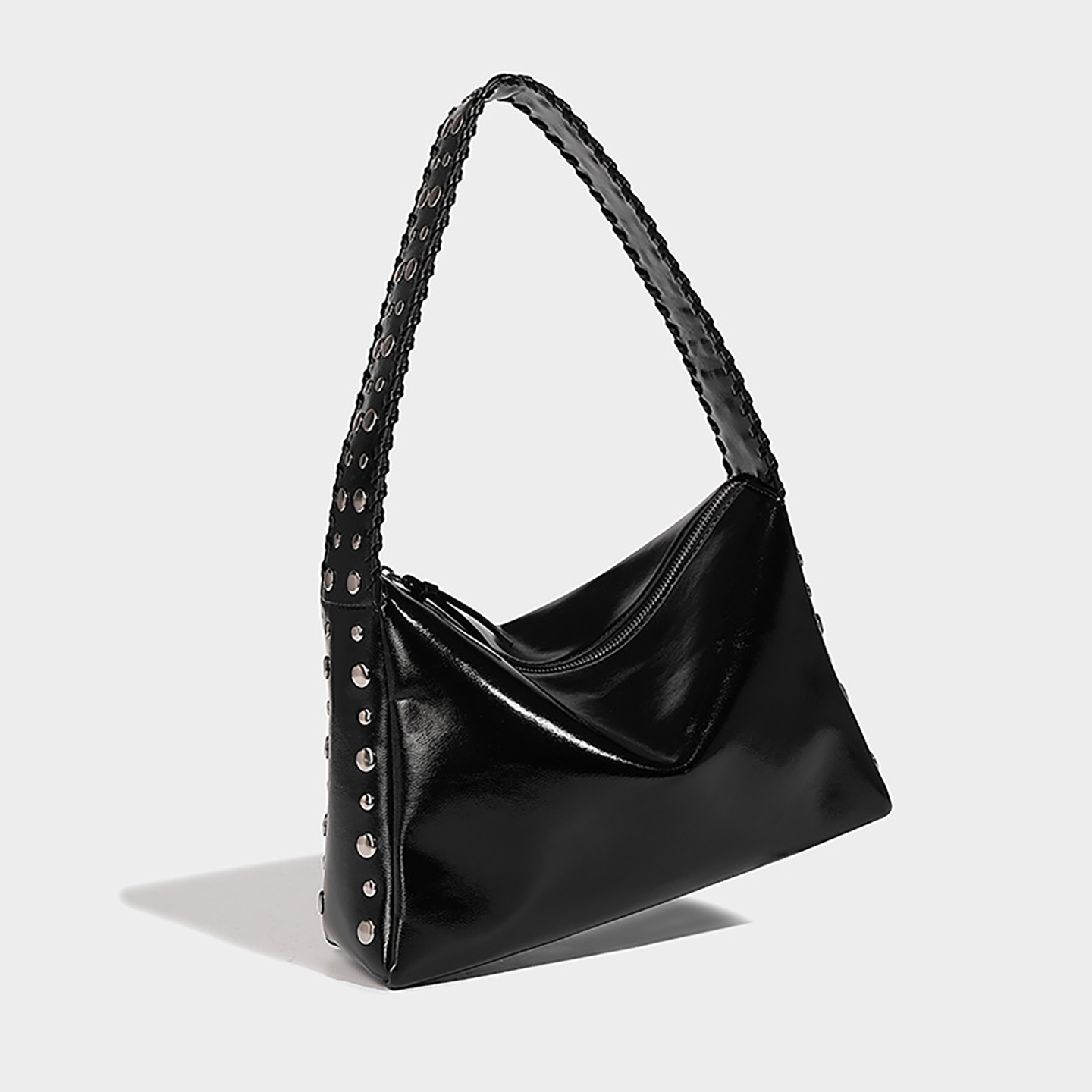 Side view of black oil wax PU leather shoulder bag showing zipper and shape