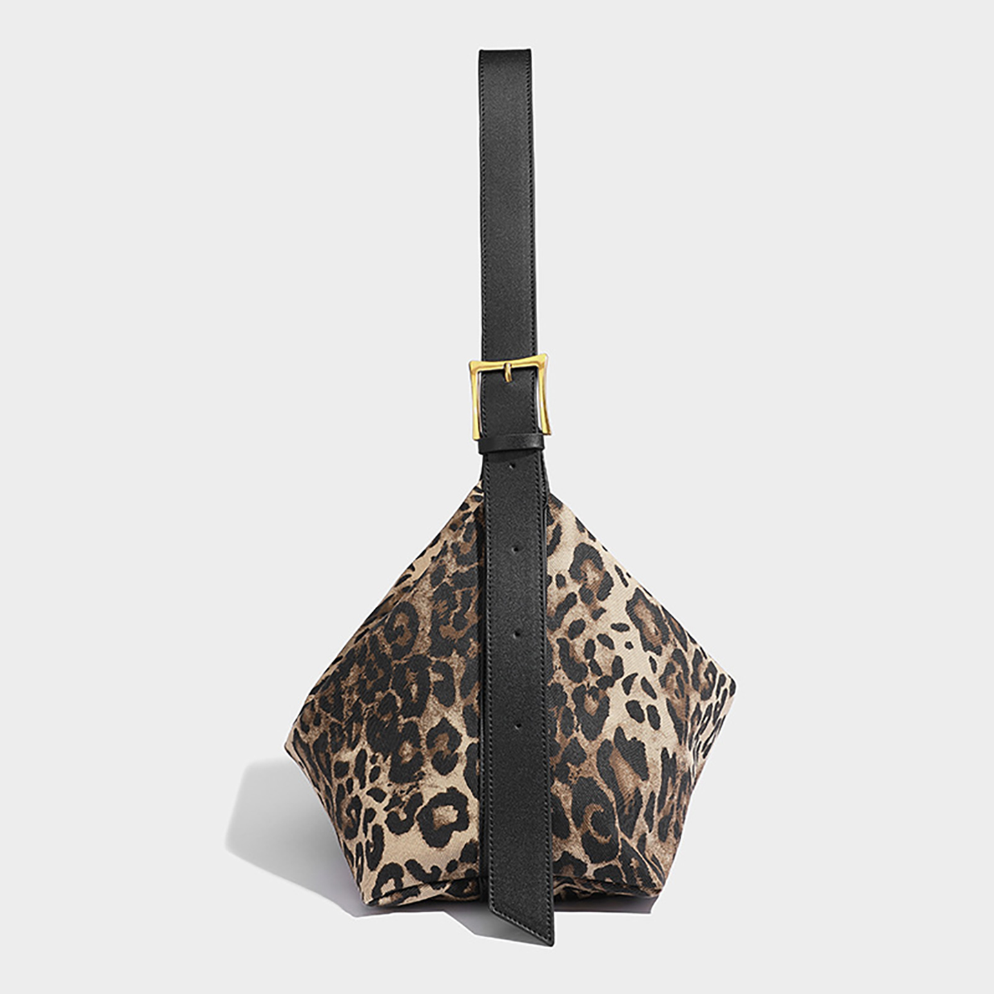 Side view of leopard print hobo bag showing slouchy shape and zipper