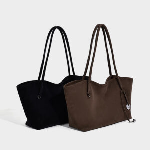 Group shot of slouchy tote bags in black and brown