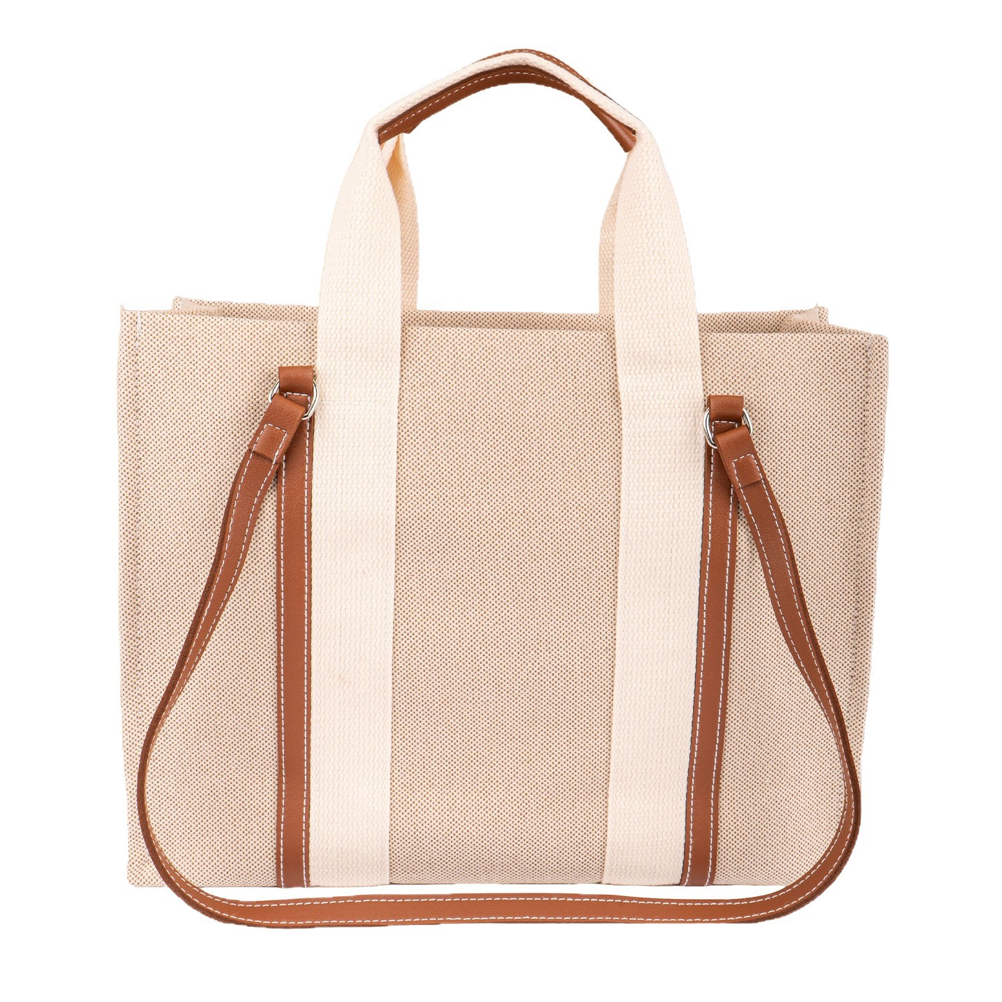 Front view of large canvas tote bag for women with beige body and brown leather trim, horizontal square shape