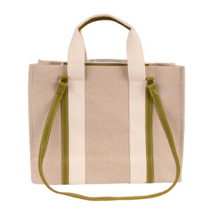 Front view of large canvas tote bag for women with beige body and green leather trim, ideal for summer