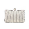 Front view of wholesale rhinestone handbag with pearl embellishments for women