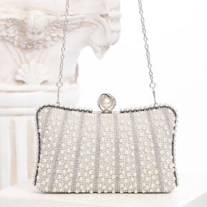 Crossbody view of evening clutch with detachable chain strap for versatile carry