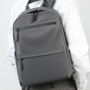 Model wearing gray korean backpack, unisex school daypack view