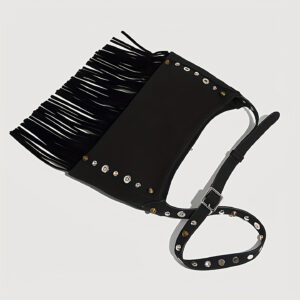 Flat lay of black PU suede tassel bag showing studded strap and hardware