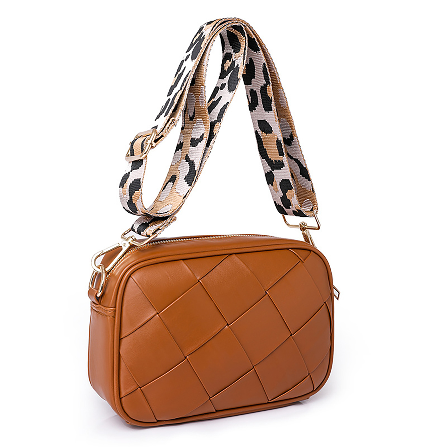 Brown woven handbag shown with adjustable leopard-pattern shoulder strap, three-quarter view