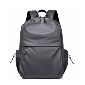 Side profile of gray 14-inch laptop backpack showcasing padded straps and water-resistant polyester material for business trips.