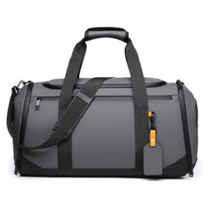 Side profile of gray travel duffel showcasing adjustable shoulder strap and structured cylindrical shape for weekend trips.