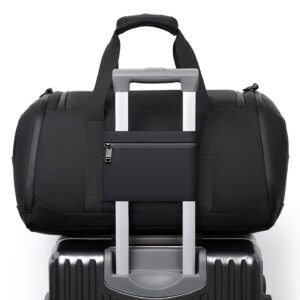 black water-resistant men's duffel gym bag with padded handles