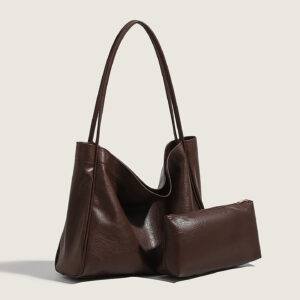 Angled shot of brown vintage-style shoulder bag, minimalist design for all seasons