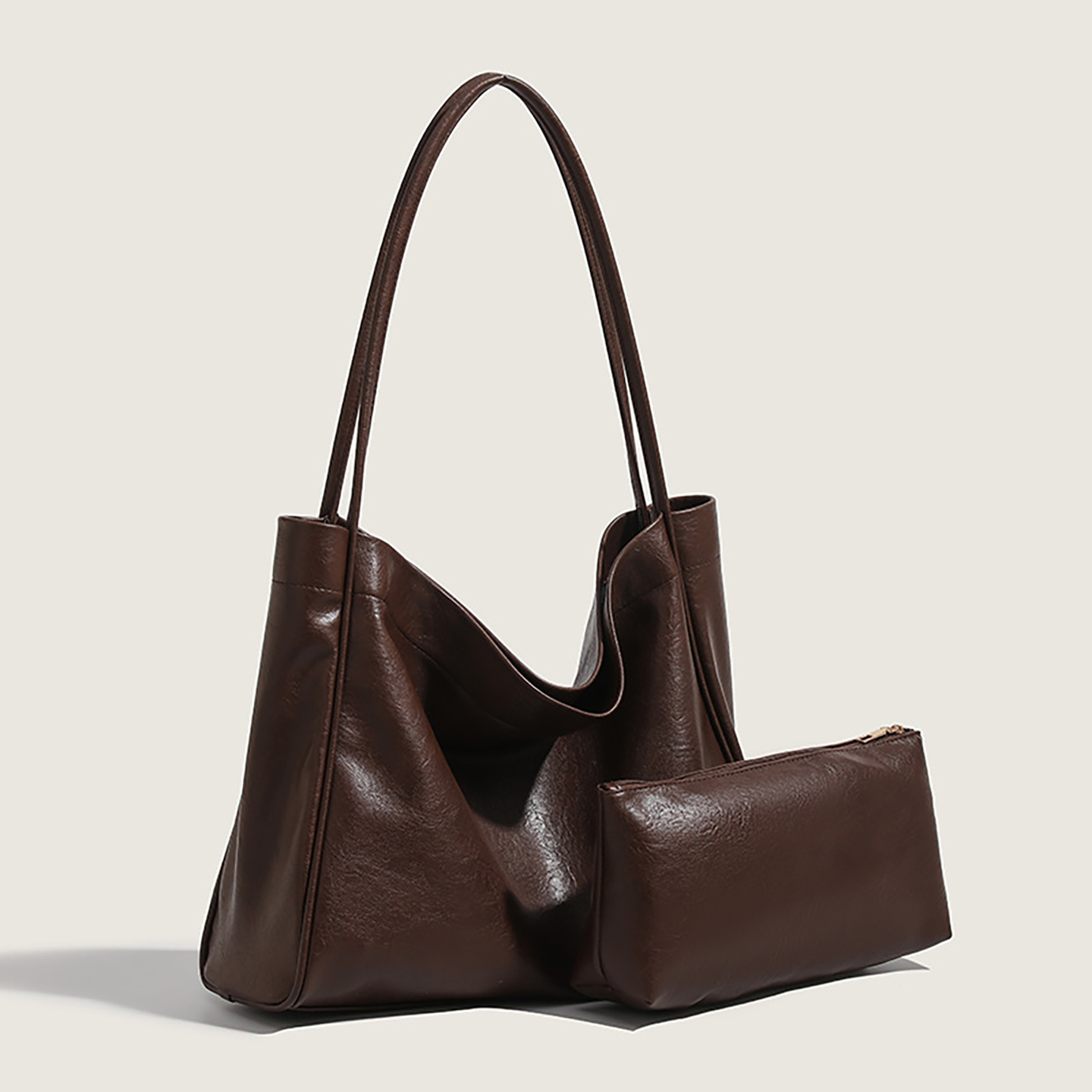 Angled shot of brown vintage-style shoulder bag, minimalist design for all seasons