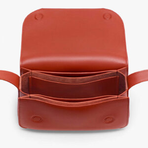 Open interior view of terracotta purse revealing inner zipper pocket and PU lining