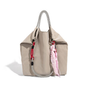 Front view of light gray PU leather bucket bag with playful striped design and vibrant accents