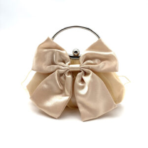 Beige champagne satin evening purse featuring bow shape and clasp closure for bridal events
