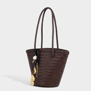 Dark brown woven bucket bag including drawstring inner pouch for organized storage