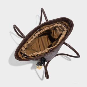 Open view of brown bohemian bucket bag showing polyester lining and inner drawstring pouch