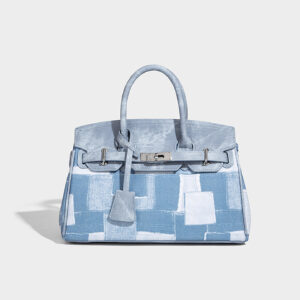 Front view of blue denim patchwork vintage crossbody bag for women