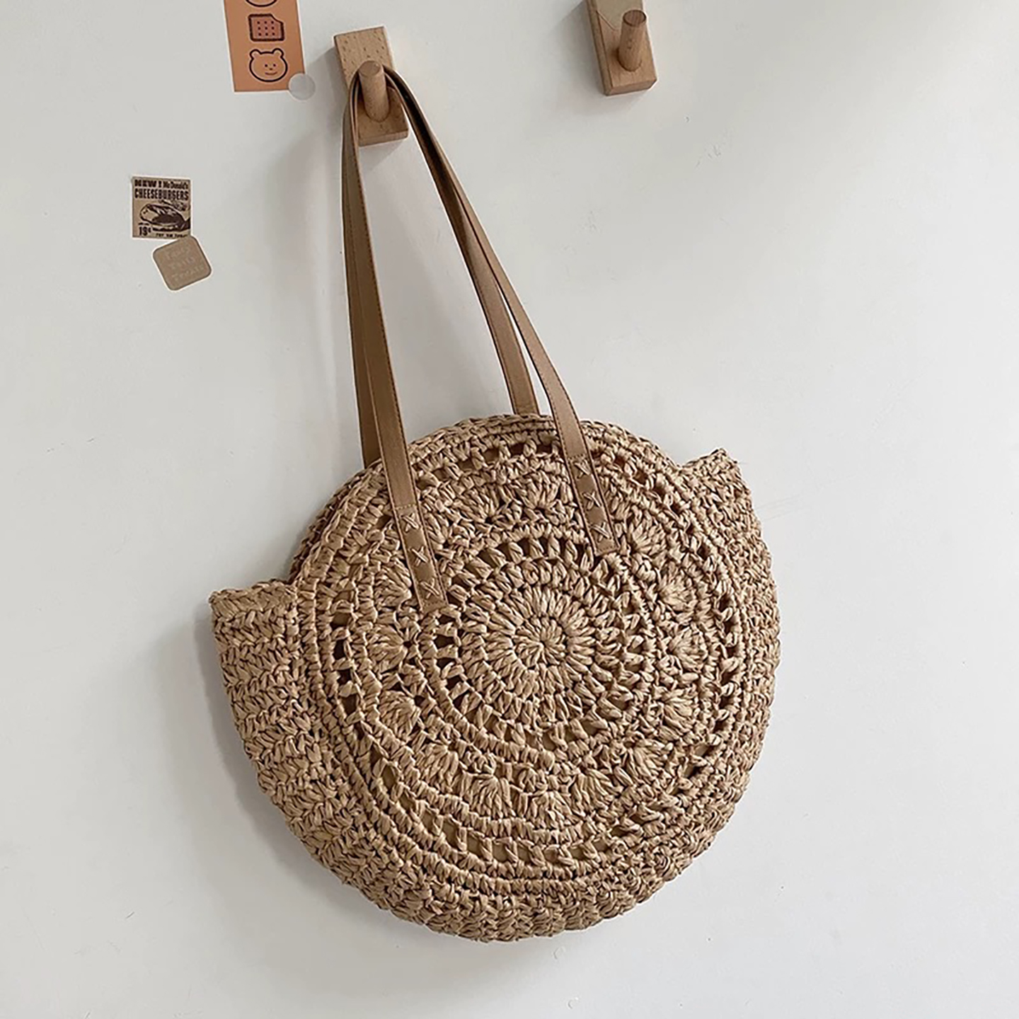 Side angle of brone round beach bag tote showing zipper closure