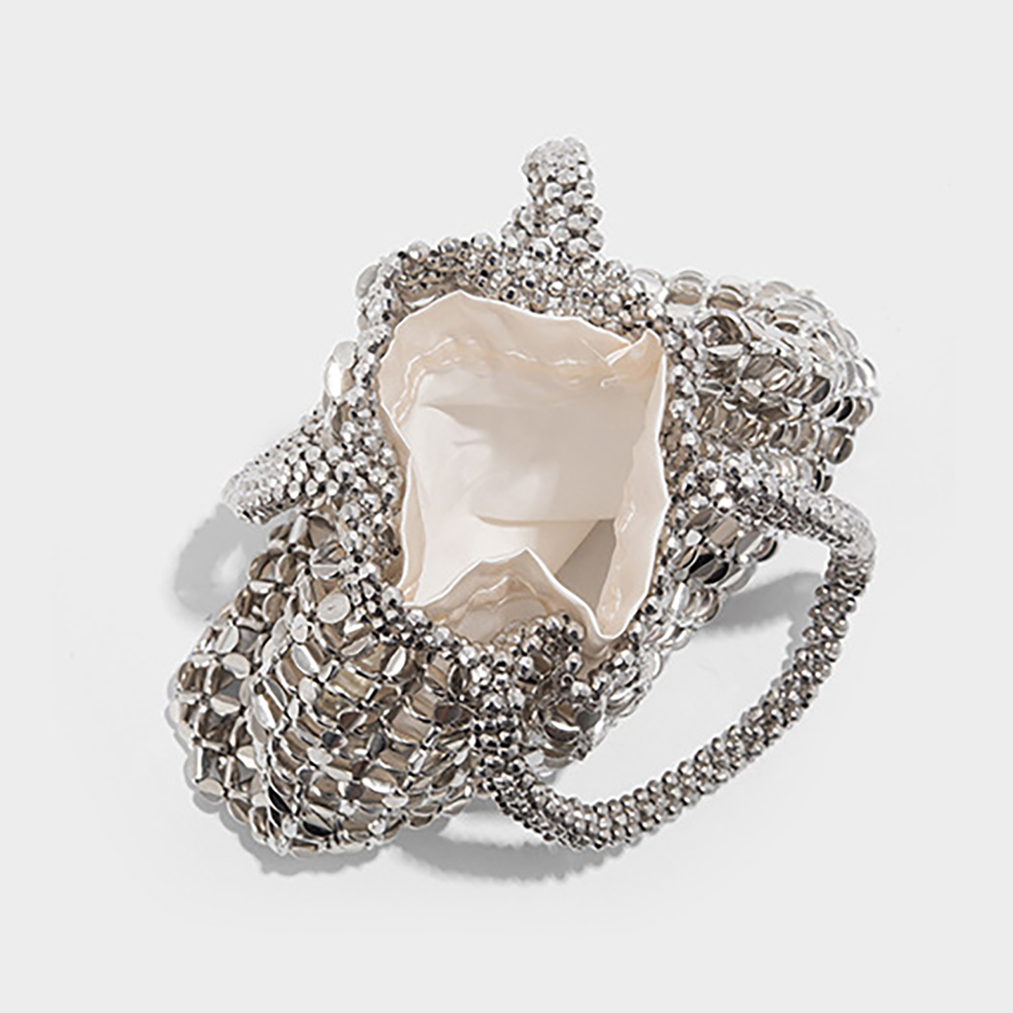 Open interior view showing inner patch pocket in beaded shoulder bag