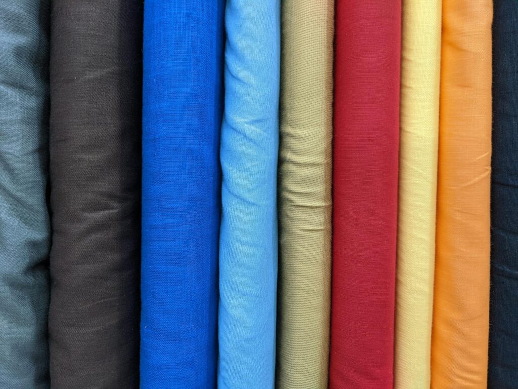 Close up of Colorful fabrics Photo by Zeya Irish