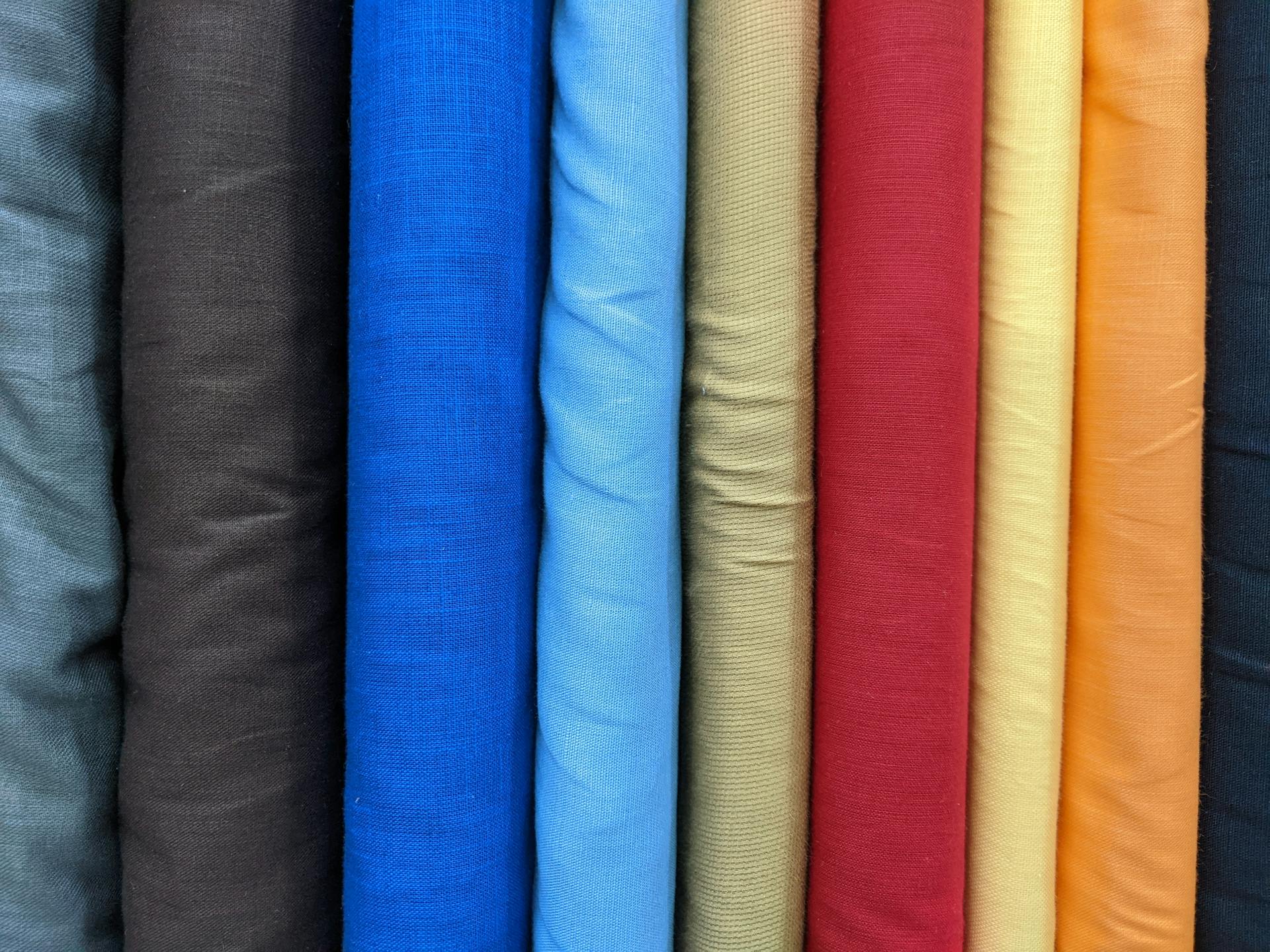 Close up of Colorful fabrics Photo by Zeya Irish