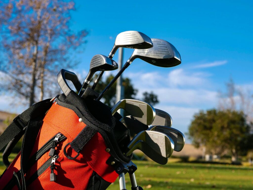 Branded custom golf bags on a golf course showing logo personalization and team colors-photo-by-pexels