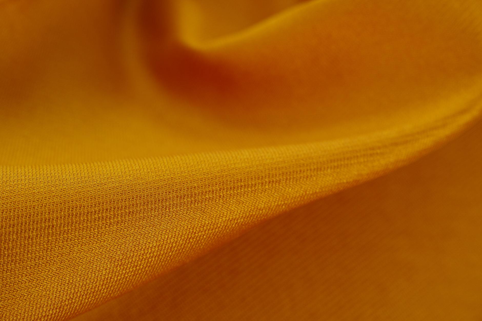 Macro comparison of smooth polyester fibers versus rough cotton fibers-photo-by-pexels