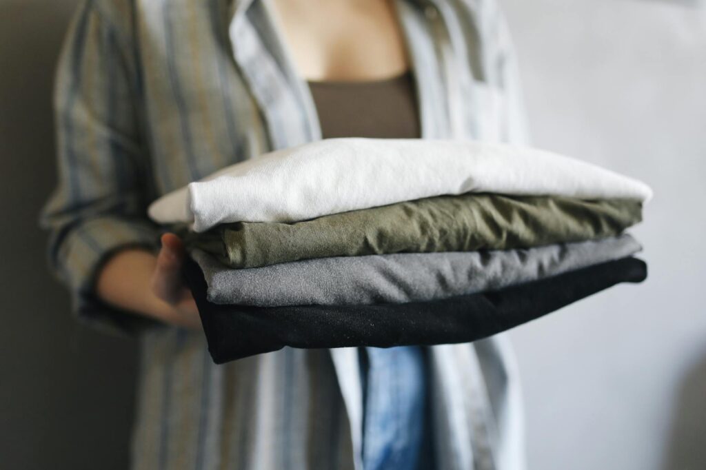 Side-by-side cotton and polyester shirts showing a shrunken cotton shirt and a crisp polyester shirt after washing-photo-by-pexels