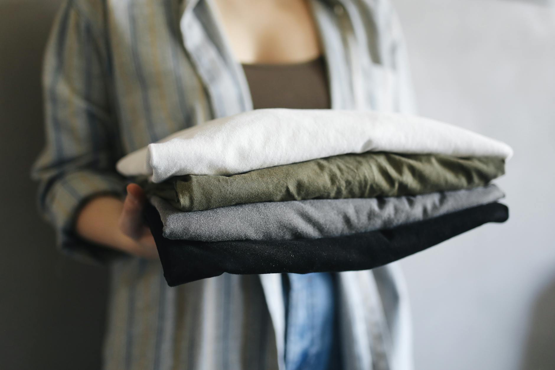 Side-by-side cotton and polyester shirts showing a shrunken cotton shirt and a crisp polyester shirt after washing-photo-by-pexels